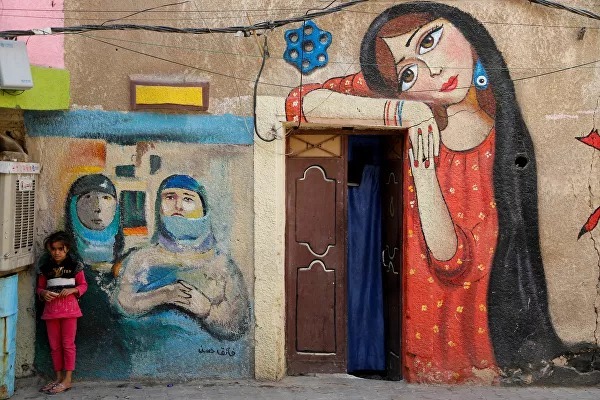 نقش های رنگارنگ بر دیوارهای خانه‌های قدیمی بغداد